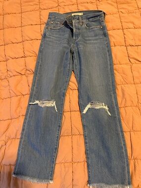 Levi's Straight Leg Distressed Jeans in Medium Blue